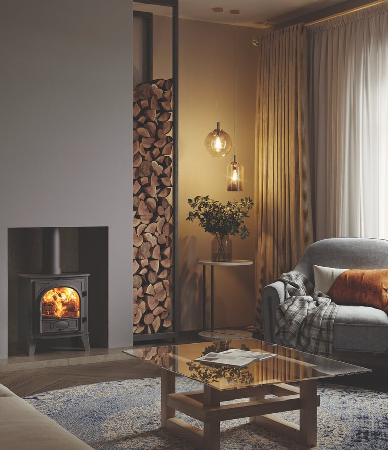 Modern wood burning stove in a cosy home with stacked kiln dried firewood