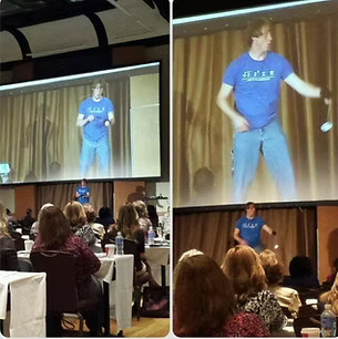 A photo of Ian Smith during a This Autistic Life presentation.