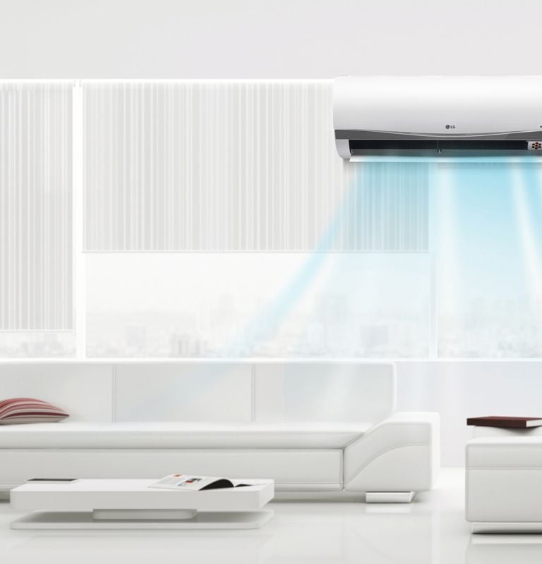a room with a white couch and a white couch