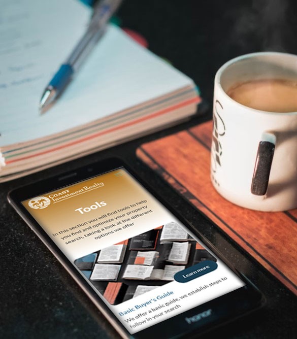 Coast investment Realty WebSite in a phone