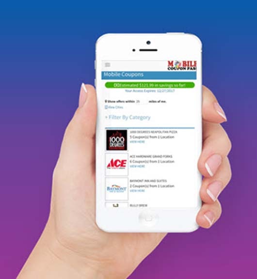 a person holding a phone with mobile coupons on it