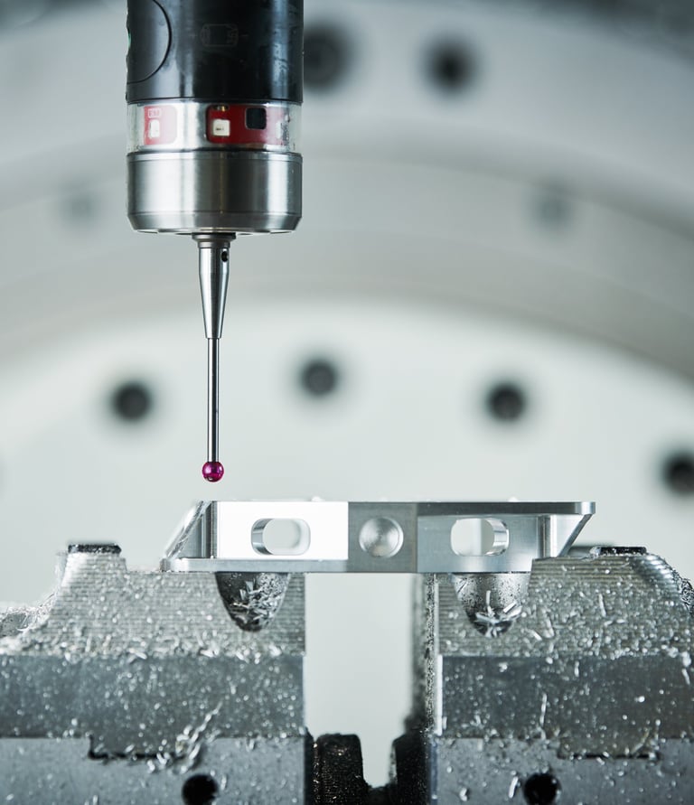 Precision CNC probe measuring a metal part in a high-tech industrial machining center.