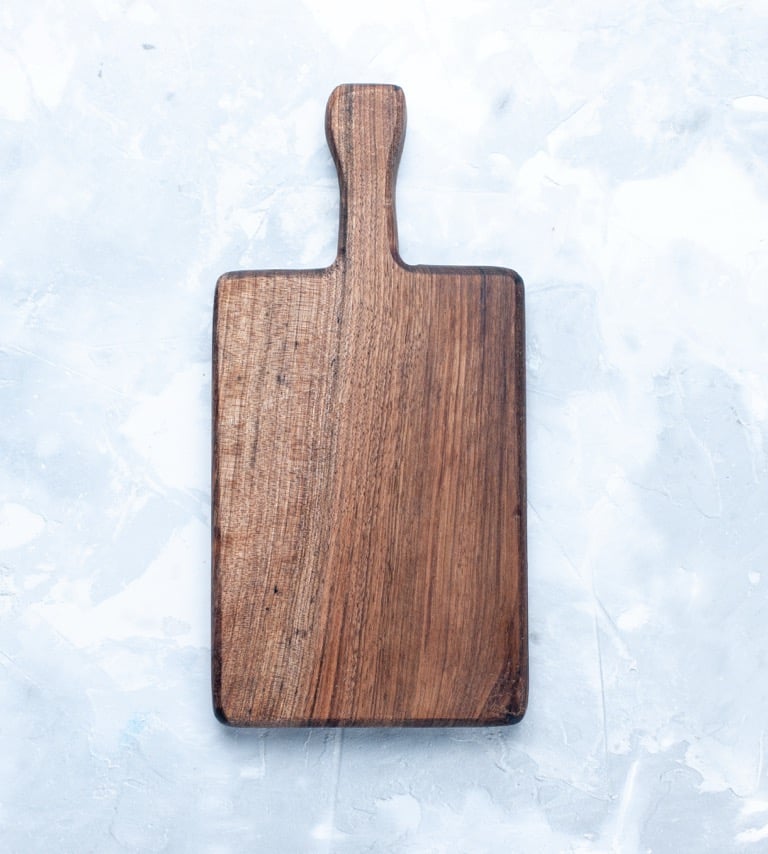 top-down view wooden serving board walnut