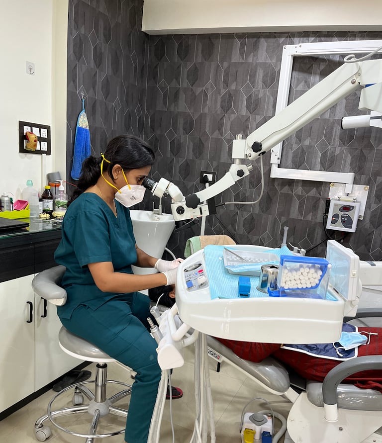 Dr. Pallavi Surwade Jamodkar doing complex RCT under microscope for best results.