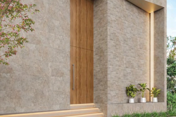 Manrise Enterprises - Limestone effect outdoor porcelain tiles used on a building