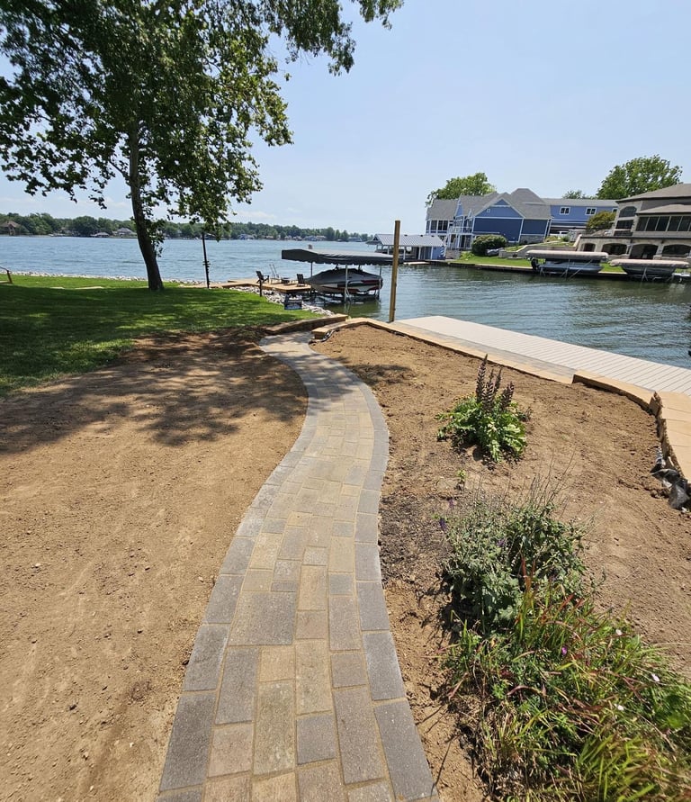 Custom sidewalk to the lake in Heritage Lake