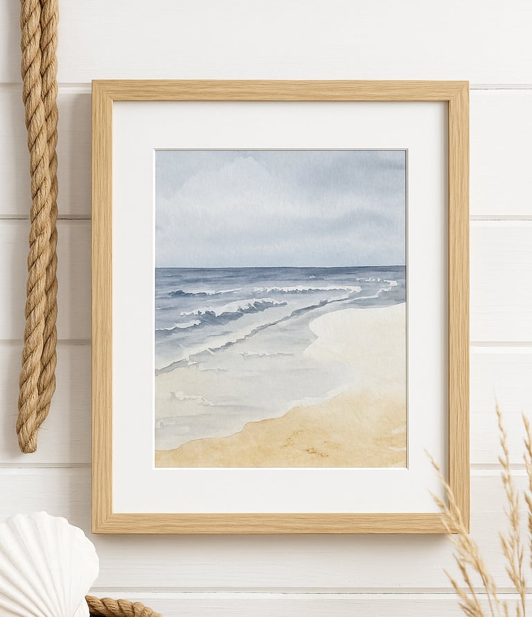 coastal watercolor painting hanging on a coastal themed shiplap wall with rope and shells