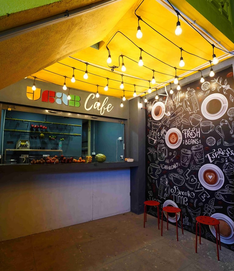 a cafe with a chalkboard wall mural