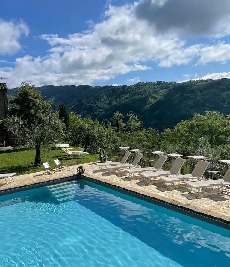 view of tuscany and pool where people will stay on a retreat