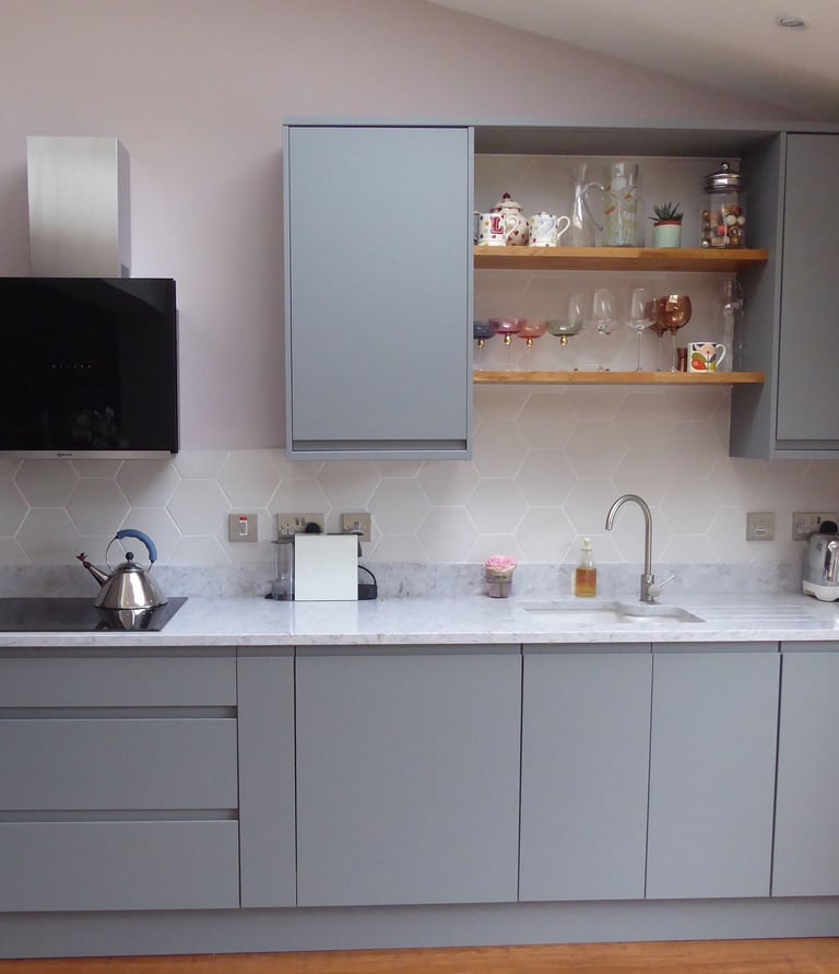 a kitchen with a sink and a counter top