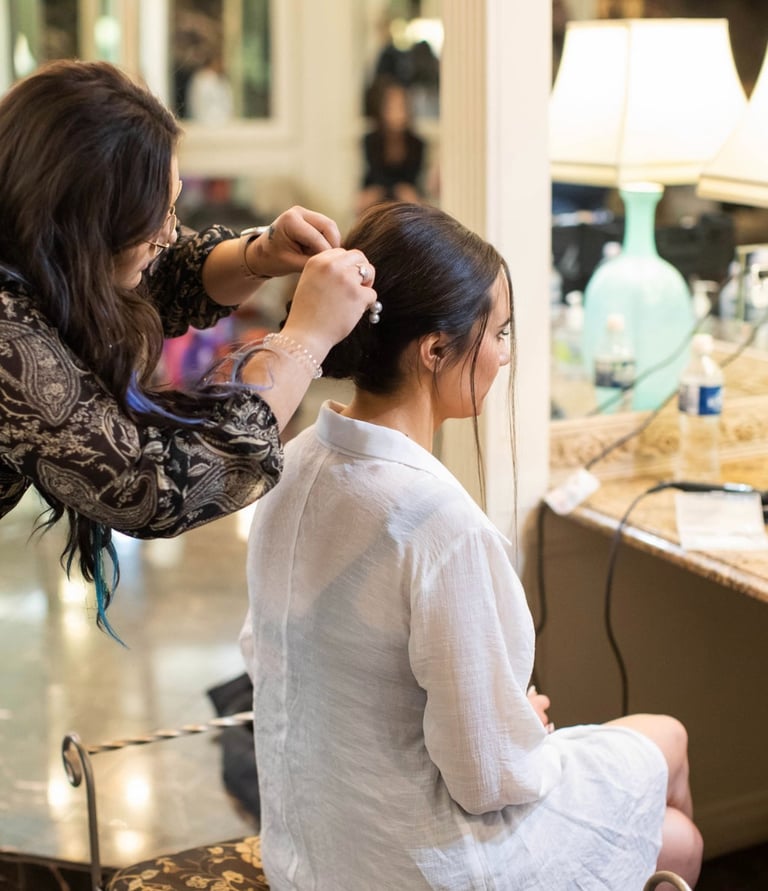 stylist doing bridal hair