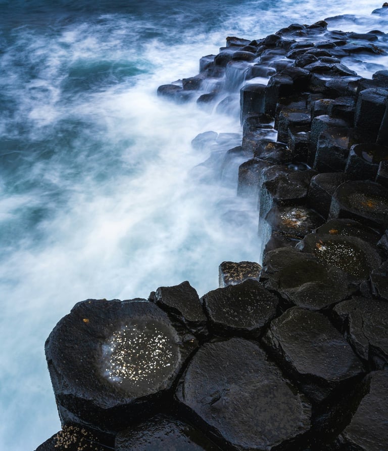 a large rock formation on the edge of a cliff Giant's Causeway