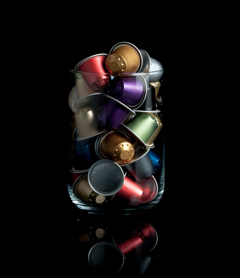 Real Coffee aluminum capsules designed for freshness and flavor