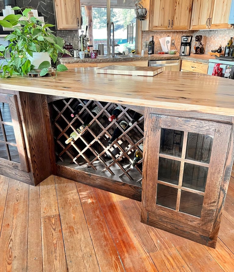 Rustic kitchen island featuring a built-in wooden lattice wine rack and butcher block countertop.