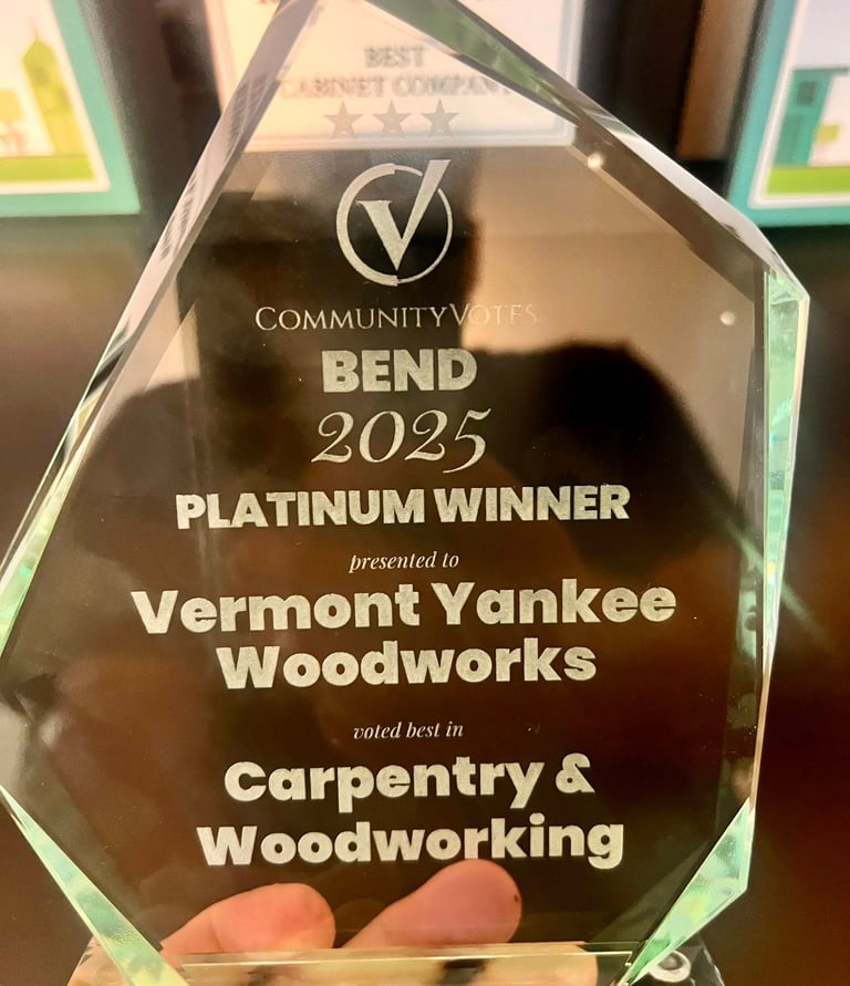 CommunityVotes Bend 2025 Platinum Winner glass award for Vermont Yankee Woodworks in Carpentry and Woodworking.