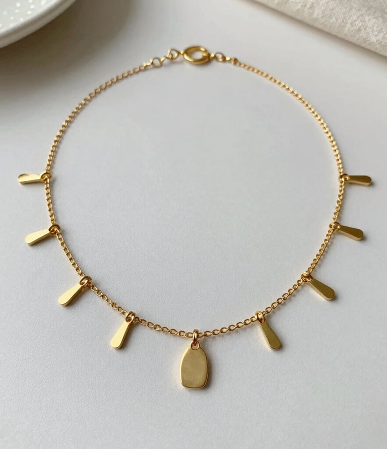 A close-up of a master jeweller’s hands delicately shaping a gold necklace in a traditional workshop.