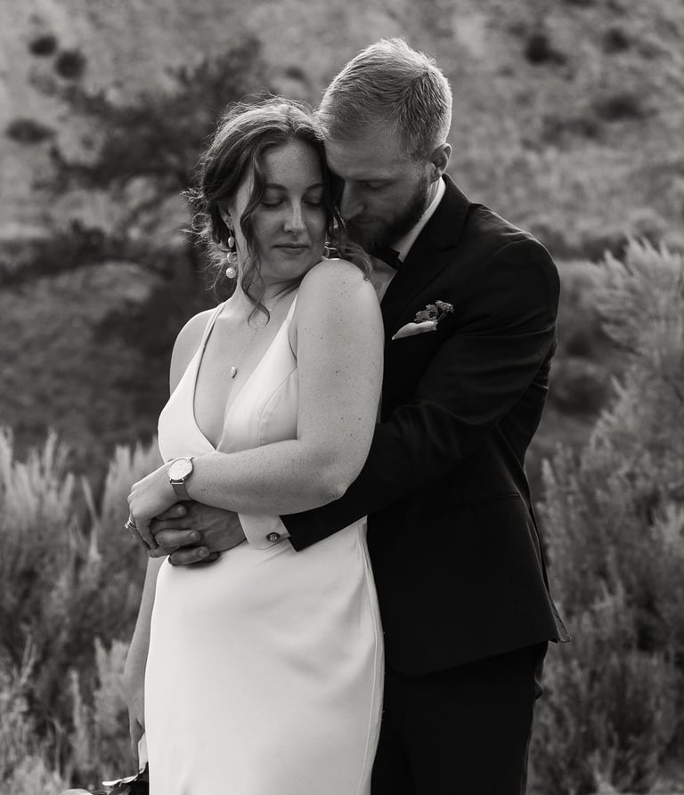 a bride and groom embracing