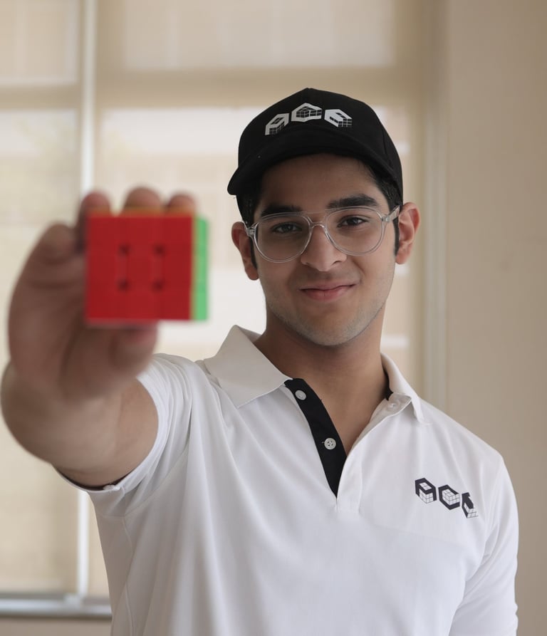 Medhansh Seth holding a cube 