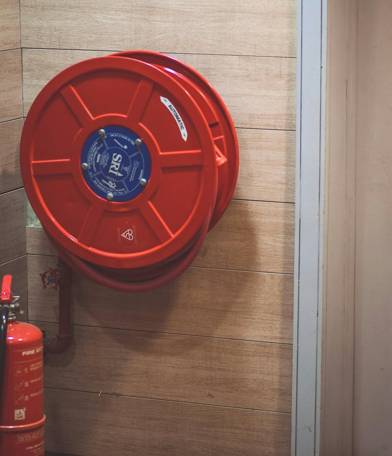 Fire hose & extinguisher in a office building