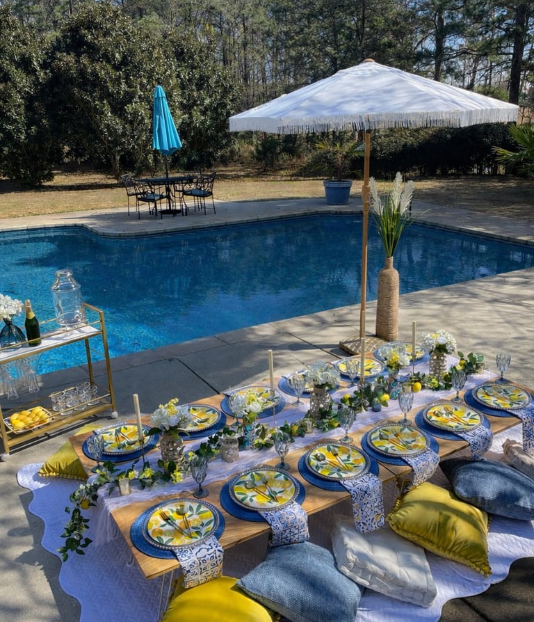 Santorini blue and white Italian lemon theme picnic by the pool Northeast Georgia garden party setup