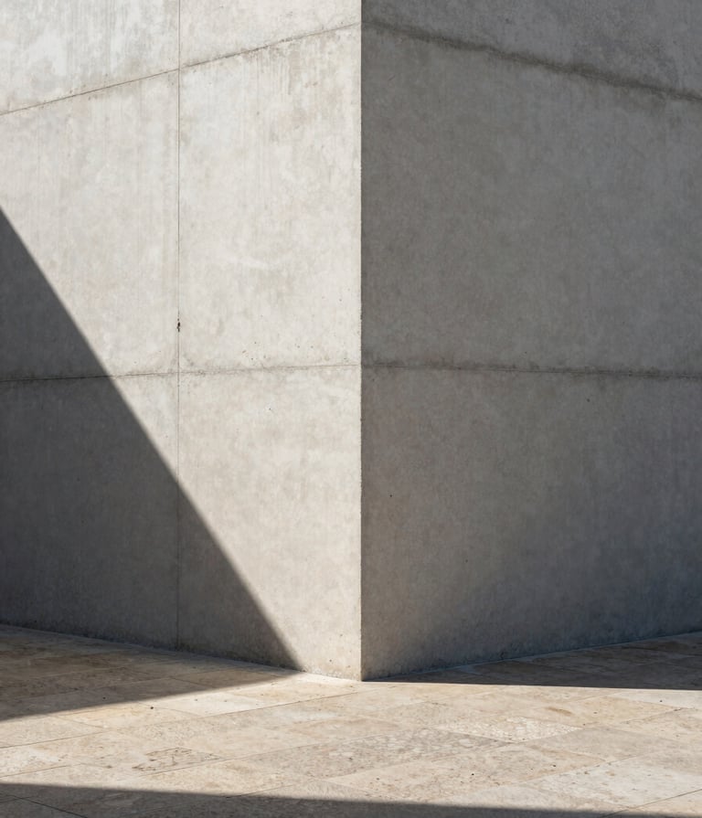 Detailed architectural photography of a raw concrete wall corner meeting a textured stone floor, sharp dramatic shadows from direct sunlight, minimalist European Portuguese architecture style, off-white and slate grey tones.