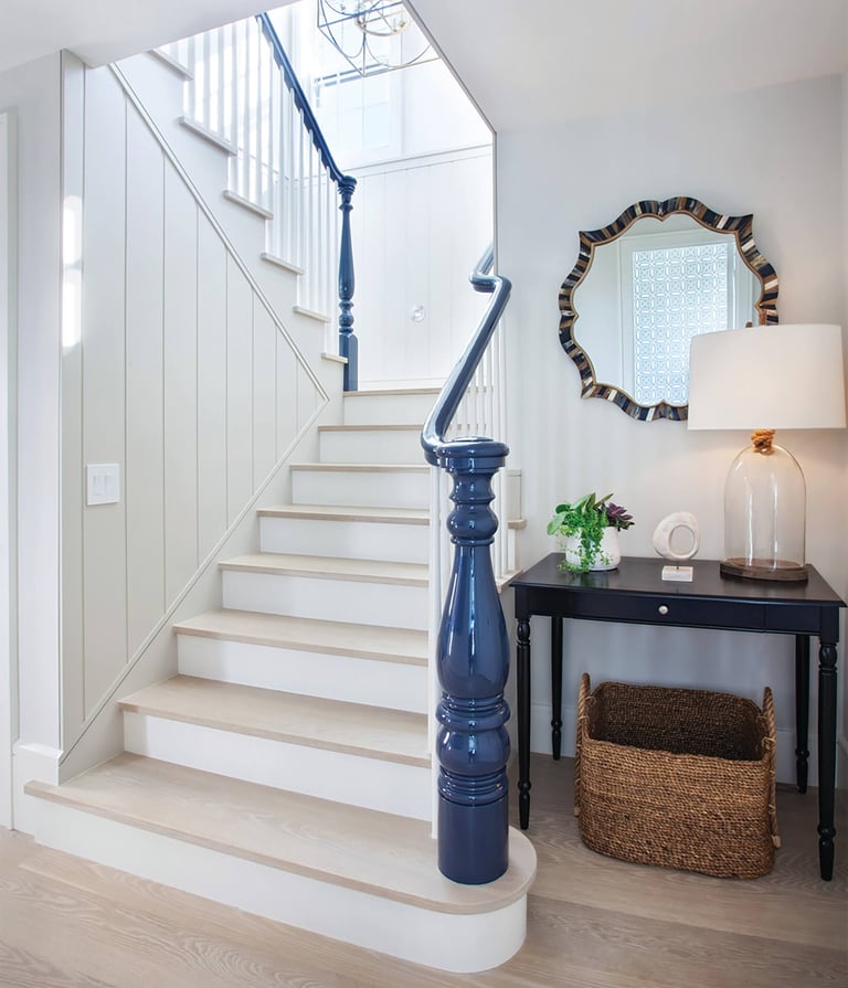 a staircase way with a lamp and a lamp
