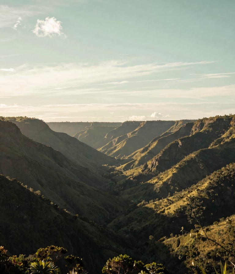 A wide-angle cinematic shot of the lush, mountainous Vale do Aço landscape in Brazil during the golden hour. The sky is a mix of pearl white and soft sage green. The composition is atmospheric and professional, showcasing the natural beauty of the South American / Brazilian environment.