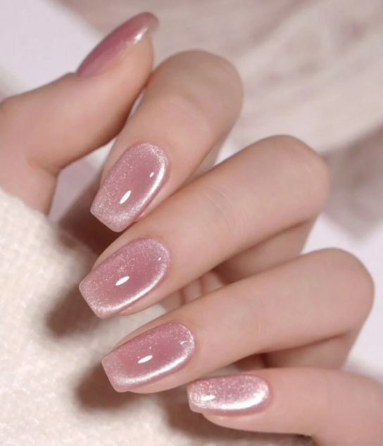 Pink resin stone press-on nails for a woodland fairy floral baby shower look