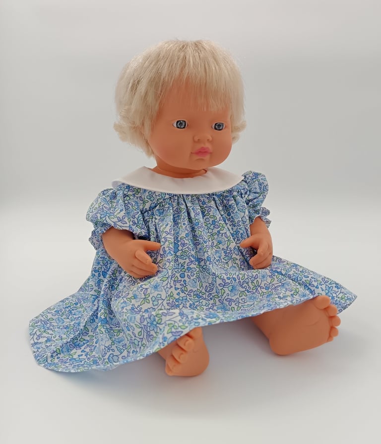 Miniland doll in dress with round collar