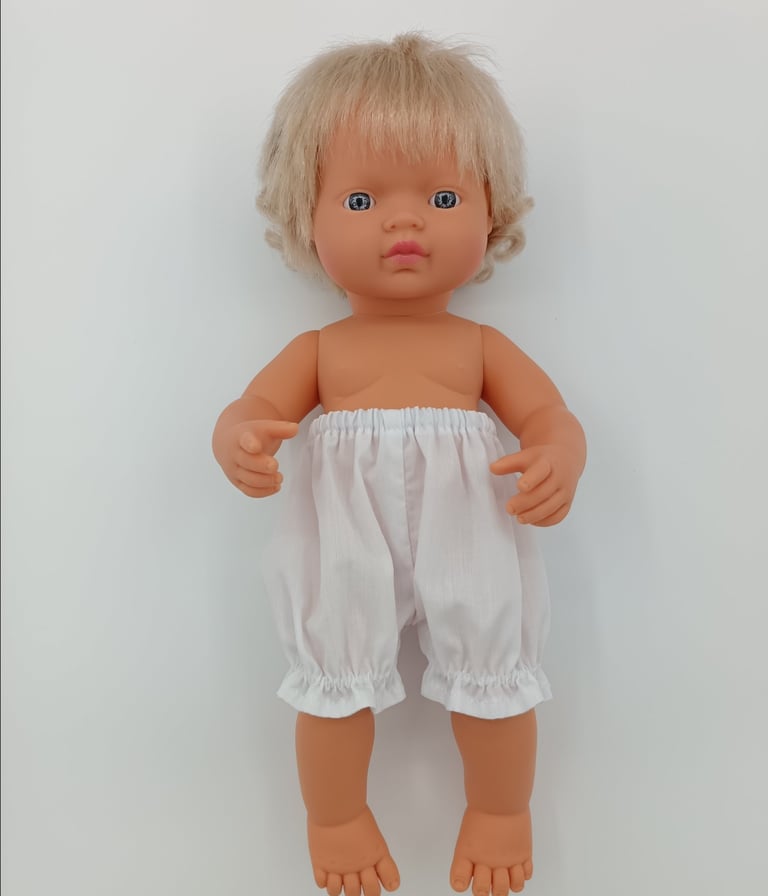 Miniland doll wearing white bloomers