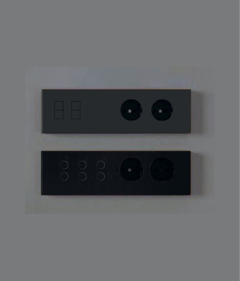 Diseño minimalista con interruptores empotrados en pared blanca junto a escalera contemporánea