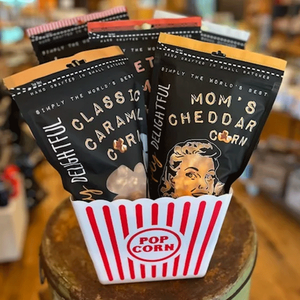 a popcorn box with popcorn and popcorn