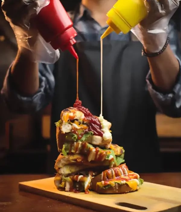 Pouring Ketchup and mayonnaise from bottles