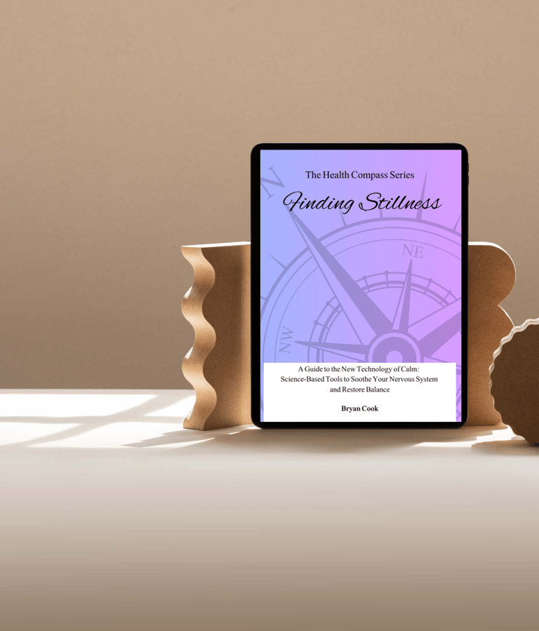 a tablet with a digital ebook cover 'finding stillness' on it