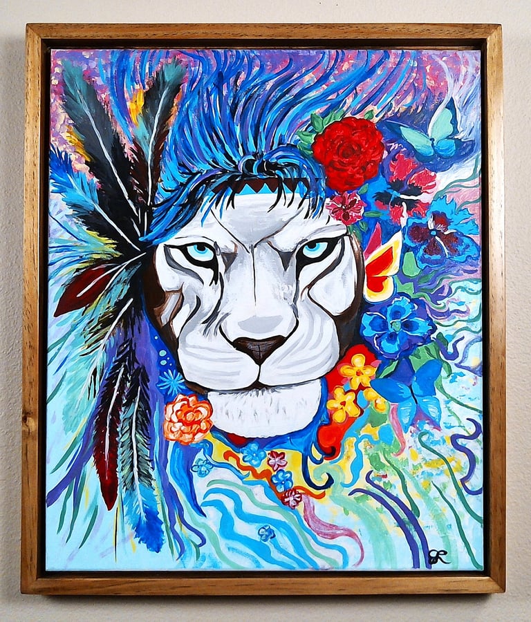 a painting of a lioness with a flower in her hair. 20" x 24" canvas.