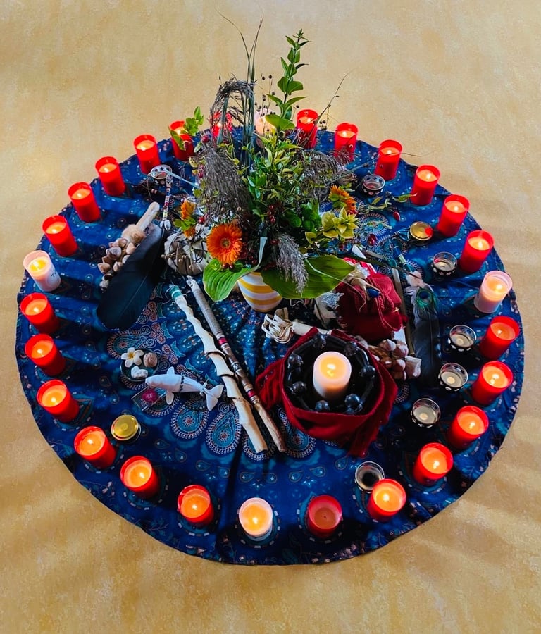 An Altar with a candle and flowers