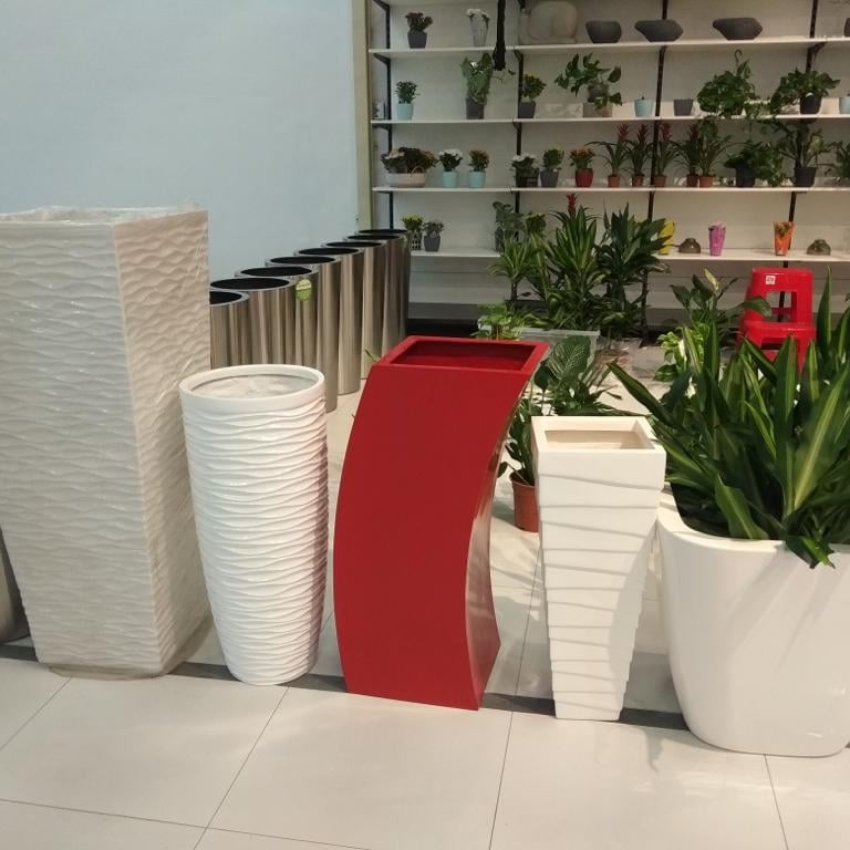 Modern GRP planter pots and decorative fiberglass planters in various sizes and finishes, suitable f