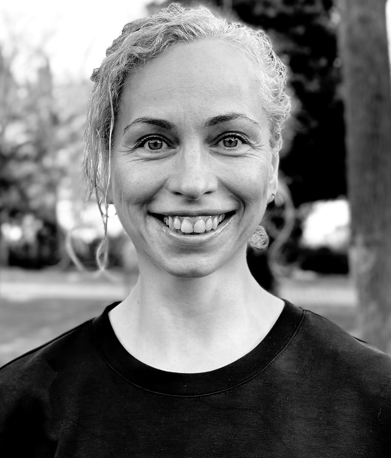 Nihan Gencer, Tai Ji and Qi Gong instructor at WDP Türkiye, smiling outdoors in natural light.