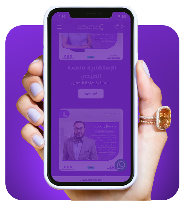 a person holding a phone with a purple background