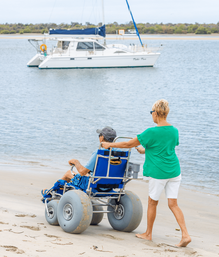 Using a beach wheelchair in the beach in Thailand. Making our beach accessible.