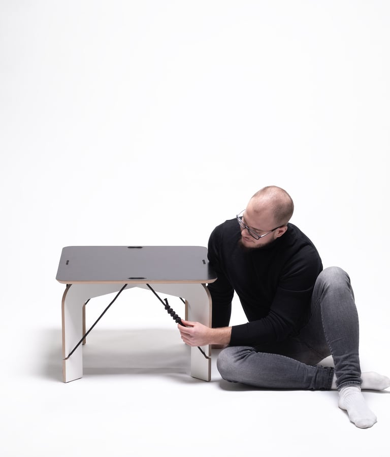 SOLIDO zero-waste coffee table: CNC-cut plywood sheet transforming into legs and tabletop with jute 