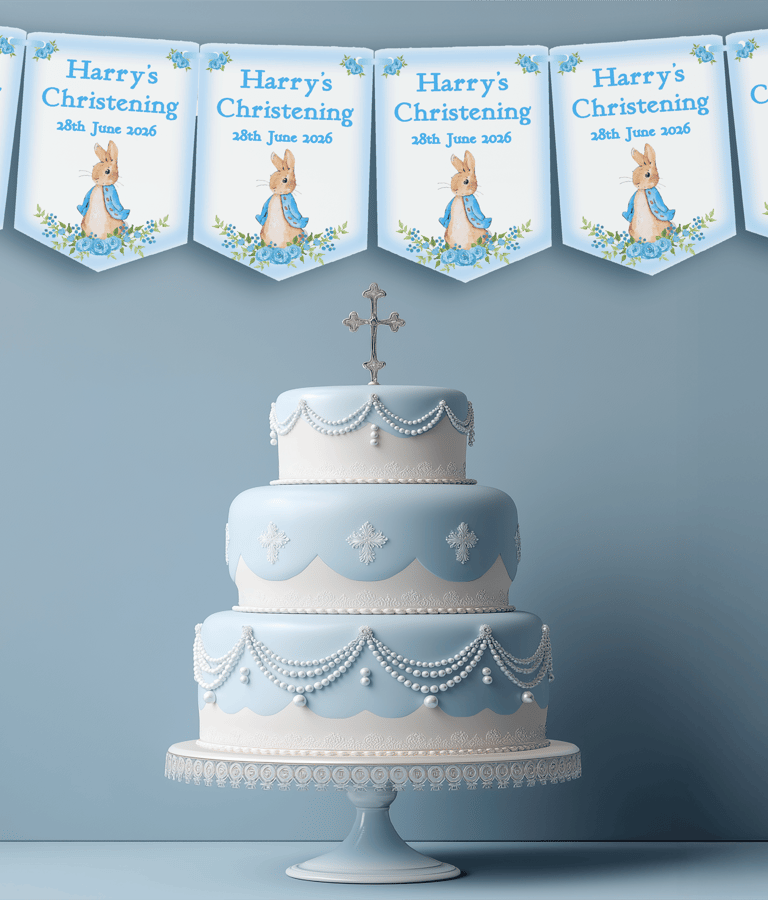 Personalised blue Peter Rabbit christening bunting displayed above a christening cake. Personalised 