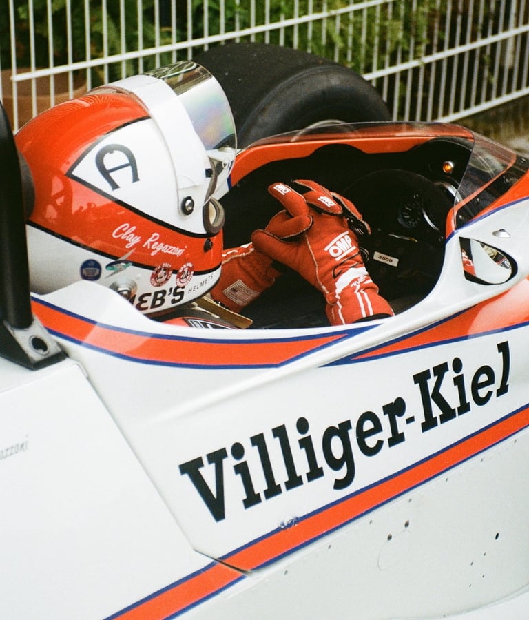 a race car driver getting ready before the race