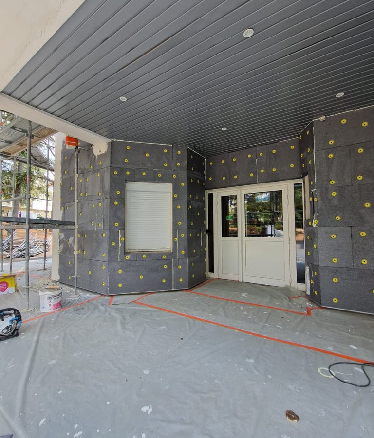 a house with a large window and a door