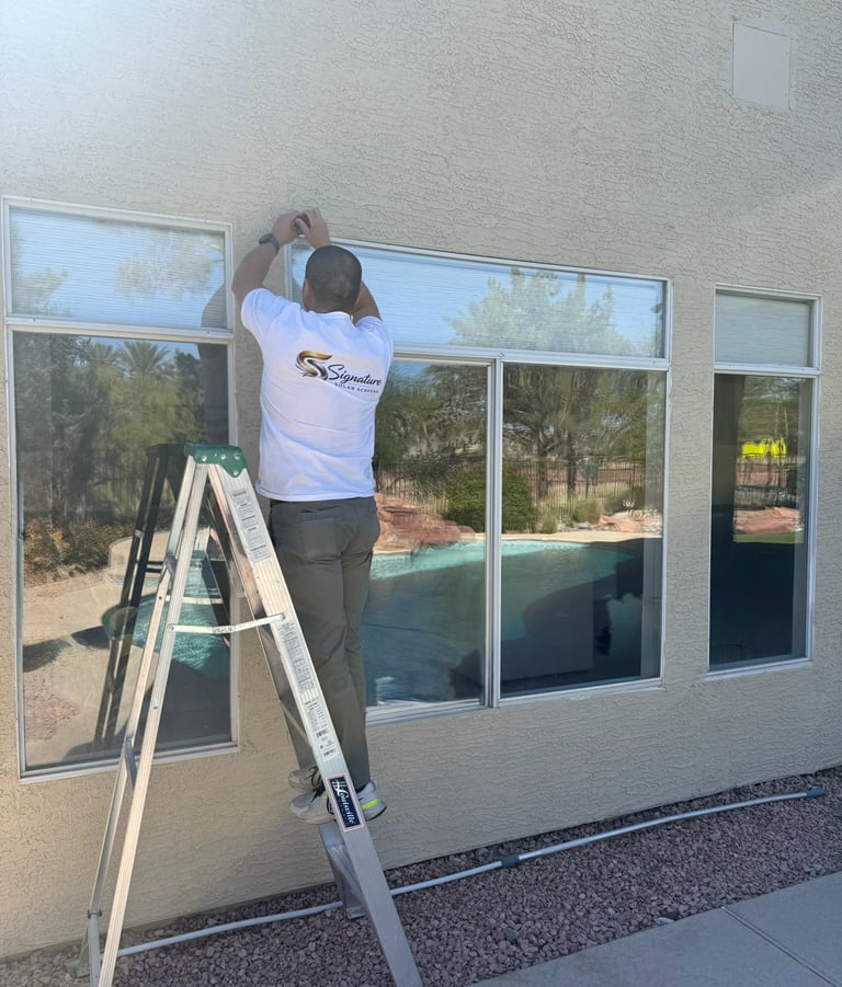 Our team preparing for a solar screen install