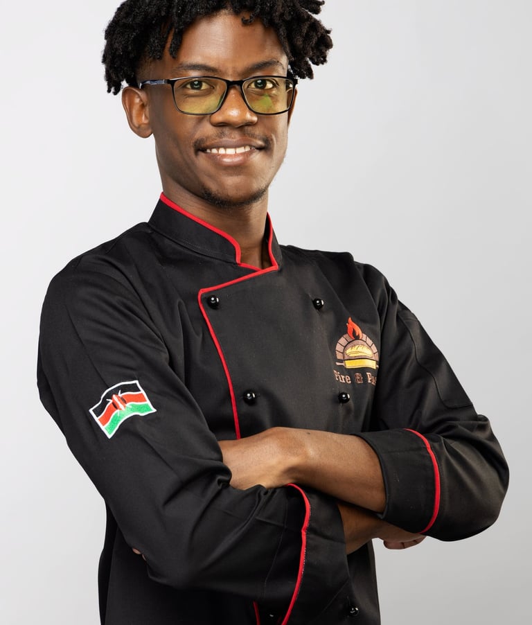 a man in a chef's uniform with a chef's coat