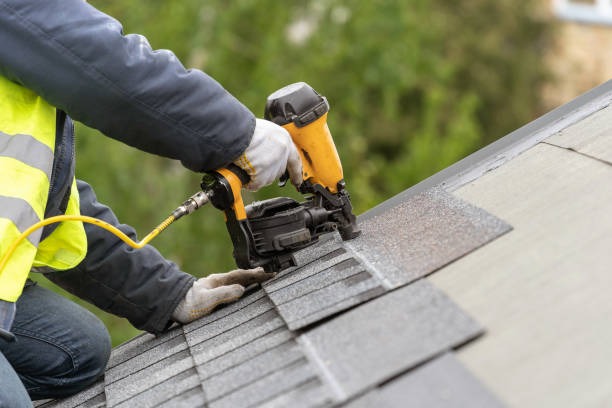 stapling in new roof tiles