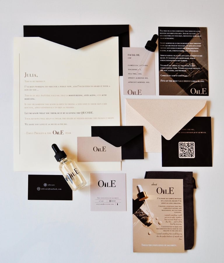 Luxury facial oil skincare packaging flat lay with minimalist bottles, stationery, and black envelopes.