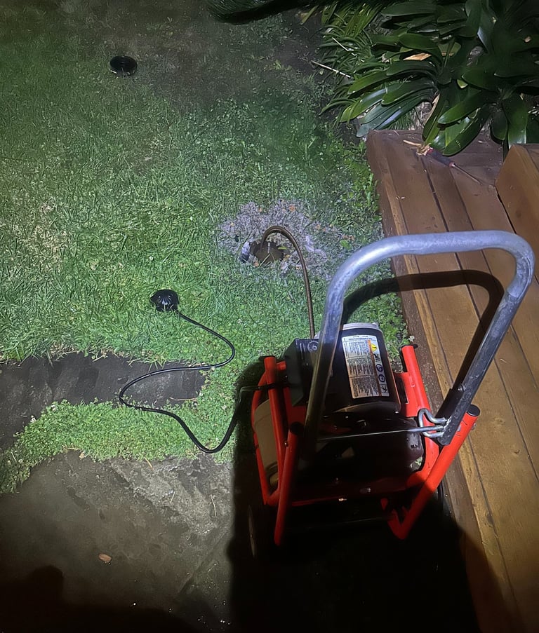 Emergency plumber repairing burst pipe in Culver City California