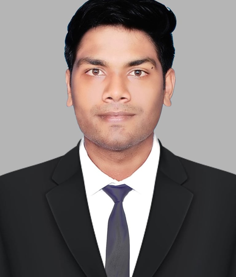 Akhil A R in a suit and tie with a tie